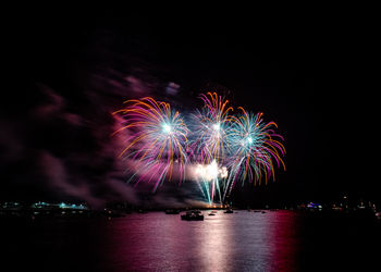 Firework display at night