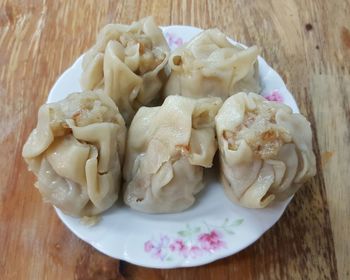 Close-up of dumplings served on table