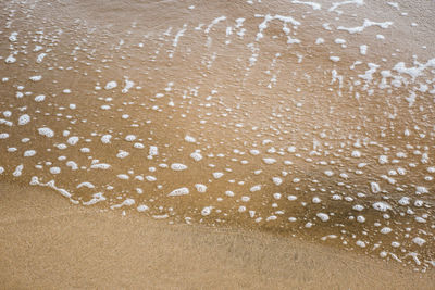 Full frame shot of sand on beach