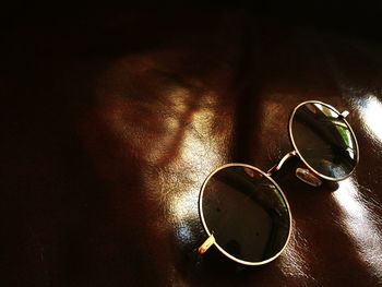 Close-up of sunglasses on table