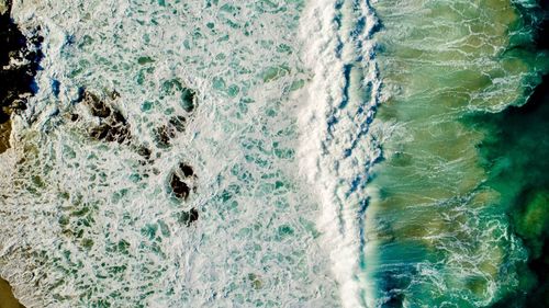 High angle view of wave in sea