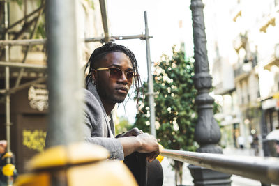 Portrait of young man outdoors