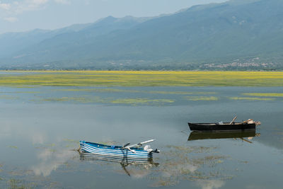 Scenic view of lake by mountain