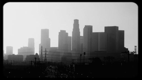 Cityscape against clear sky