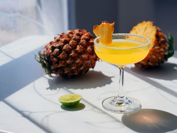 Close-up of pineapple cocktail on table