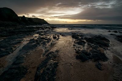 Scenic view of sea against sky during sunset