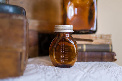 Close-up of vintage glass on table