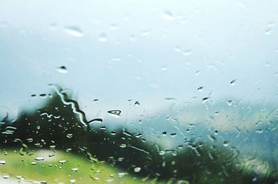 Close-up of water drops on glass