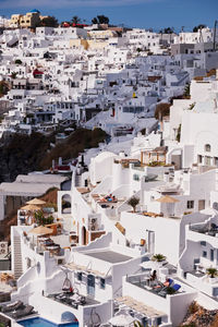Panoramic aerial view of imerovigli village in santorini island, greece - traditional white houses
