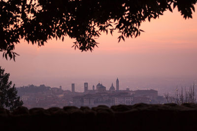 Silhouette of buildings at sunset