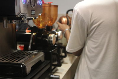 Man working at coffee cup