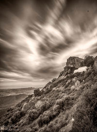 Scenic view of dramatic sky over landscape