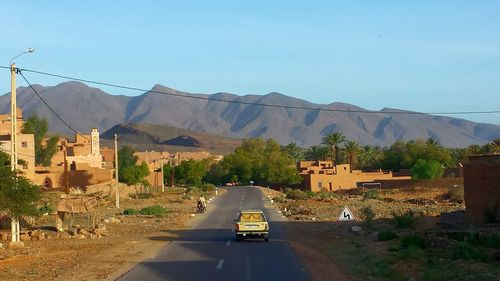 Road leading towards mountains