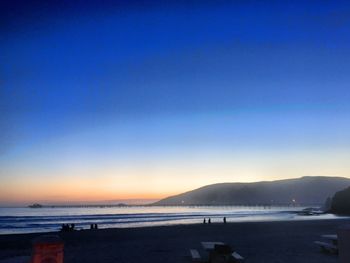 Scenic view of sea at sunset