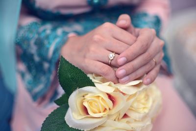 Close-up of hand holding ice cream