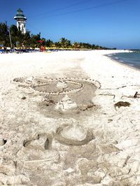 Scenic view of beach against clear sky