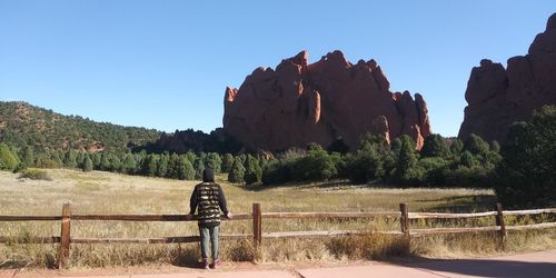 View of rock formation on landscape against clear sky