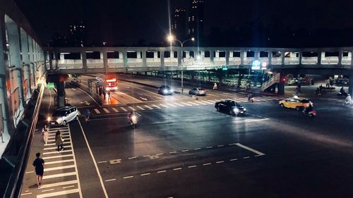 High angle view of cars on road at night