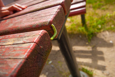 Close-up of old metal bench