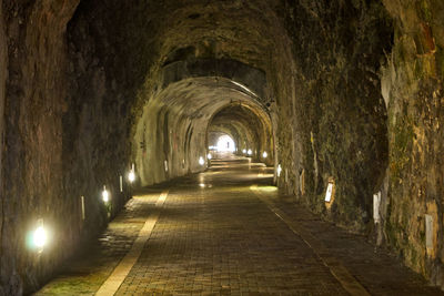 Empty corridor in tunnel