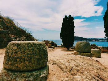 Scenic view of sea against cloudy sky