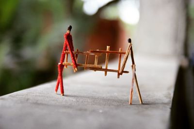 Close-up of red metallic structure in park