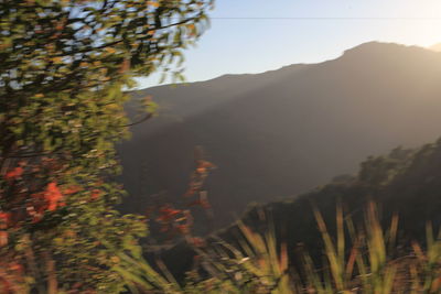 Scenic view of mountains against sky during sunset