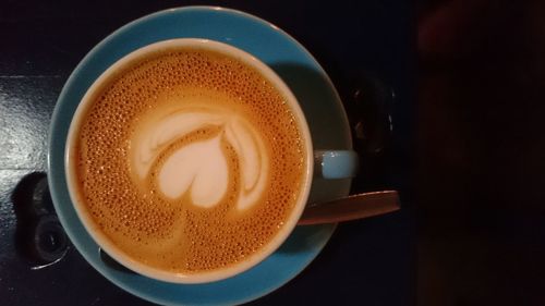 Close-up of coffee cup on table