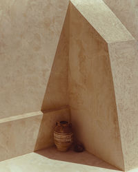 High angle view of pottery by wall