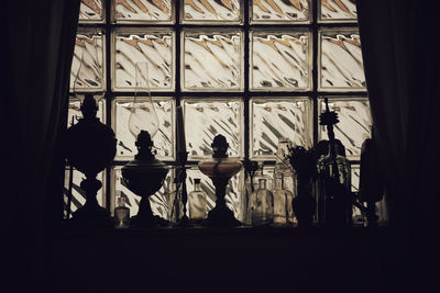 Silhouette people standing in front of museum