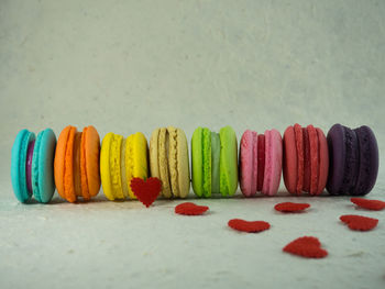 Colorful macaroons on table
