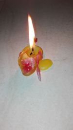 Close-up of burning candle