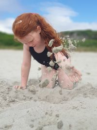 Full length of girl on sand at beach