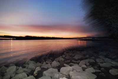 View of calm sea at sunset