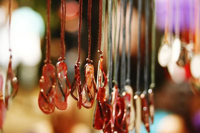 Close-up of flip-flop shape decorations hanging for sale