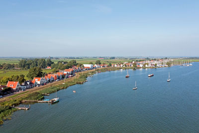 Aerial from the traditional village durgerdam in the netherlands on a beautiful summer day