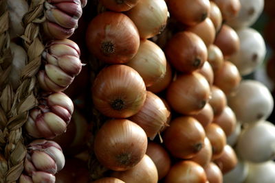 Full frame shot of onion and garlic for sale
