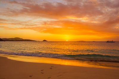 View of calm sea at sunset