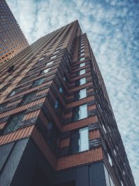 Low angle view of modern building against sky