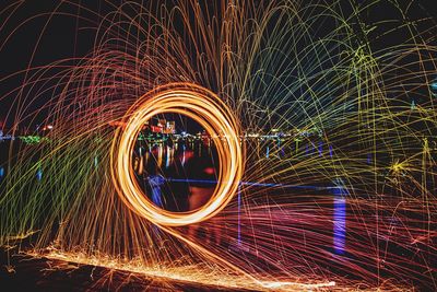 Illuminated wire wool at beach