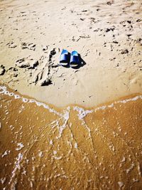 High angle view of toy on beach