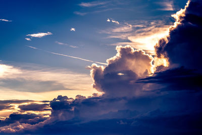 Low angle view of vapor trails in sky