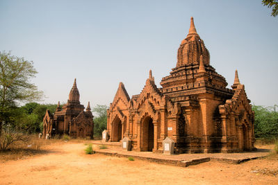 Old temple building against clear sky