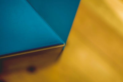 High angle view of multi colored paper on table