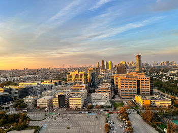 High angle view of cityscape against sky during sunrise 