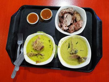 High angle view of meal served on table