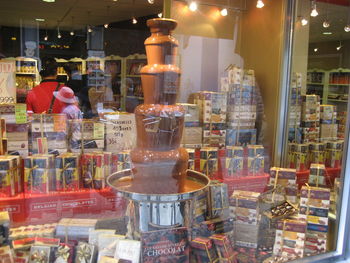 Close-up of wine bottles on display at store