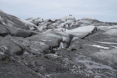 Scenic view of snow on mountain against sky