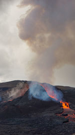 Scenic view of volcanic mountain against sky