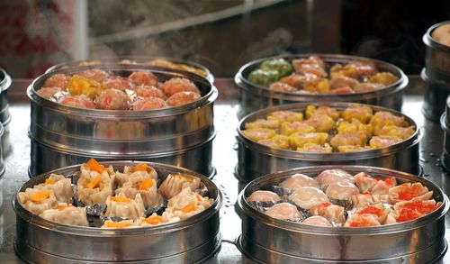 Close-up of chinese dumplings in containers